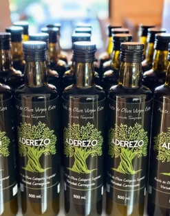 Caja de madera con 2 botellas de Aceite de 500 ml. y vaso de cata de AOVE oficial