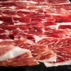 JAMON IBERICO PREMIUM LONCHEADO despiezado y presentado en sobres envasados al vacío de 200 gr ,taquitos y hueso .