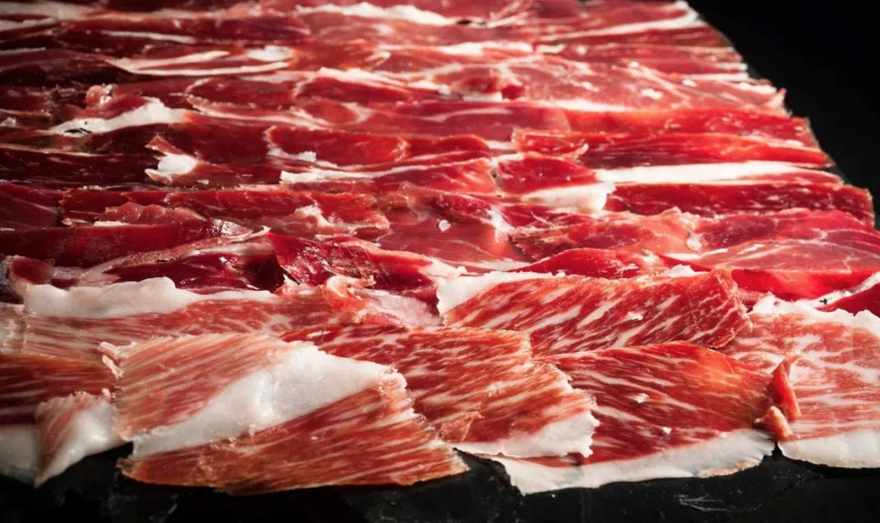 JAMON IBERICO PREMIUM LONCHEADO despiezado y presentado en sobres envasados al vacío de 200 gr ,taquitos y hueso .
