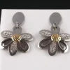 Pendientes Acero Y Oro Flor Circonitas