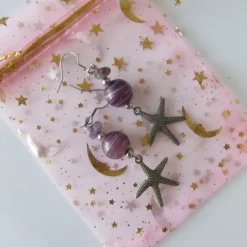 Online Che Carino Art Pendientes estrella de mar con amatista