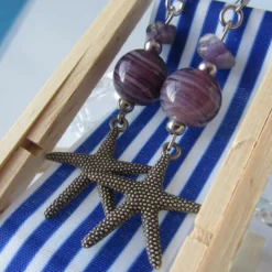 Online Che Carino Art Pendientes estrella de mar con amatista