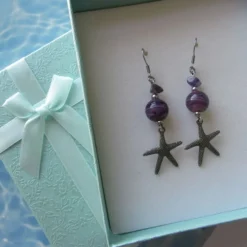Online Che Carino Art Pendientes estrella de mar con amatista